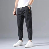 Ice Silk Pants Men's Summer Thin Section Trend Wild Loose Casual Pants Sports Pants Quick-drying Harlan Nine-point Pants