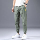 Ice Silk Pants Men's Summer Thin Section Trend Wild Loose Casual Pants Sports Pants Quick-drying Harlan Nine-point Pants