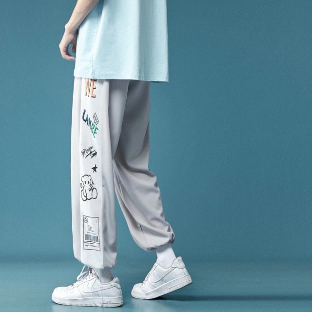 New Men's Pants Fashion Korean Style Ribbon Streetwear Harem Pants Elastic Waist Cargo Pants Men Casual Hip Hop Sweatpants Men